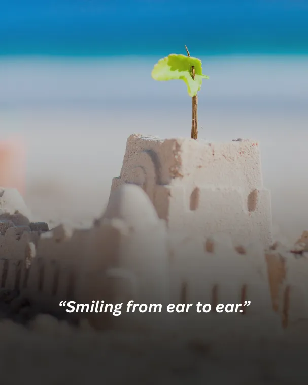 Smiling from ear to ear.